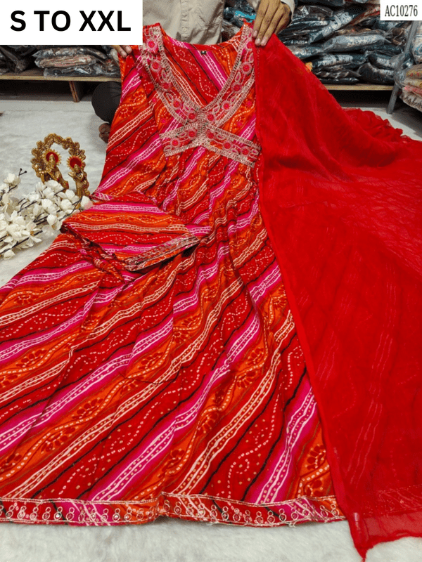 Heavy aliacut kurta with pants and dupatta in vibrant design, available in size S to XXL, from Vastra Collection.