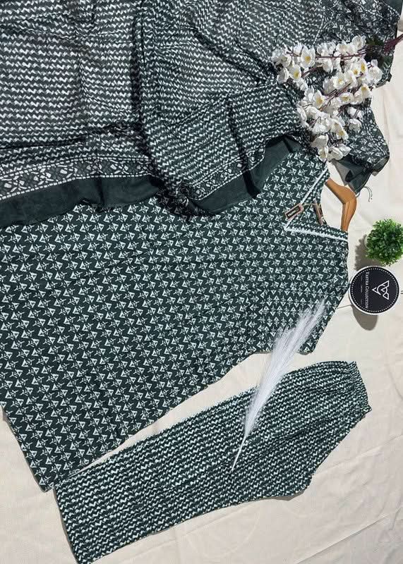 VASTRA COLLECTION readymade kurta, pant, and dupatta set in traditional design with intricate patterns and vibrant fabric.